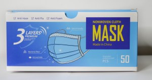 Disposable nonwoven face masks